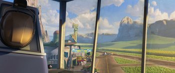Movie still from “Planes: Fire & Rescue” (2014), directed by Bobs Gannaway – An oil painting of an open road with a view of a valley; Extreme Wide shot, Low angle