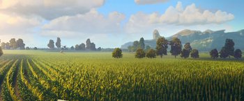 Movie still from “Planes: Fire & Rescue” (2014), directed by Bobs Gannaway – An image of an open field with trees in the background; Extreme Wide shot, High angle