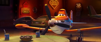 Movie still from “Planes: Fire & Rescue” (2014), directed by Bobs Gannaway – An airplane is shown in a scene from planes; Wide shot, Low angle