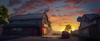 Movie still from “Planes: Fire & Rescue” (2014), directed by Bobs Gannaway – An old car is parked in front of a barn at sunset; Extreme Wide shot, Low angle