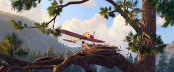 Movie still from “Planes: Fire & Rescue” (2014), directed by Bobs Gannaway – An airplane is flying over a nest on a tree branch; Wide shot, Low angle