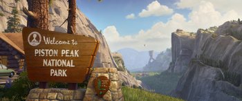 Movie still from “Planes: Fire & Rescue” (2014), directed by Bobs Gannaway – An image of an outdoor scene with a sign on the side of the road; Extreme Wide shot, Overhead angle