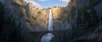 Movie still from “Planes: Fire & Rescue” (2014), directed by Bobs Gannaway – An animated scene of a waterfall and a bridge; Extreme Wide shot, High angle