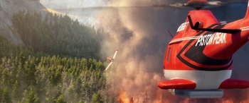 Movie still from “Planes: Fire & Rescue” (2014), directed by Bobs Gannaway – An airplane is flying over a forest fire; Extreme Wide shot, Overhead angle