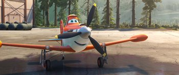 Movie still from “Planes: Fire & Rescue” (2014), directed by Bobs Gannaway – An orange and white plane is parked on the ground; Wide shot, Low angle