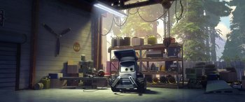 Movie still from “Planes: Fire & Rescue” (2014), directed by Bobs Gannaway – A car is in a garage with tools on the floor; Wide shot, Low angle