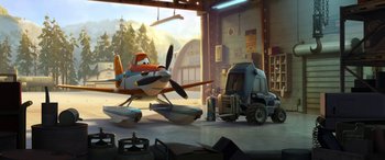 Movie still from “Planes: Fire & Rescue” (2014), directed by Bobs Gannaway – An airplane is parked in a garage with a truck; Wide shot, Low angle