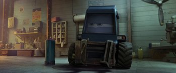 Movie still from “Planes: Fire & Rescue” (2014), directed by Bobs Gannaway – An animated car with eyes on the front of it; Wide shot, Low angle