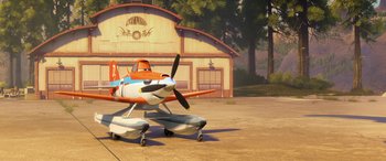Movie still from “Planes: Fire & Rescue” (2014), directed by Bobs Gannaway – An orange and white airplane sitting on top of a runway; Wide shot, Low angle