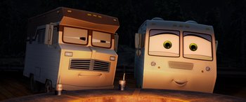 Movie still from “Planes: Fire & Rescue” (2014), directed by Bobs Gannaway – Two cartoon buses are parked next to each other; Close Up shot, Low angle
