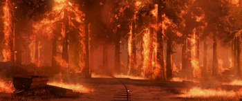 Movie still from “Planes: Fire & Rescue” (2014), directed by Bobs Gannaway – A forest is on fire with a train track in the foreground; Extreme Wide shot, High angle