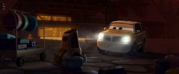 Movie still from “Planes: Fire & Rescue” (2014), directed by Bobs Gannaway – A car is parked in a parking lot at night; Wide shot, Low angle