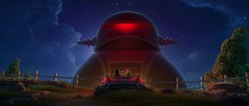 Movie still from “Planet 51” (2009), directed by Javier Abad – Two people sitting in the back of a car in front of a building; Extreme Wide shot, Low angle