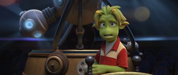 Movie still from “Planet 51” (2009), directed by Javier Abad – A cartoon of a person with green hair and a steering wheel; Close Up shot, Over the shoulder angle