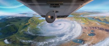Movie still from “Planet 51” (2009), directed by Javier Abad – A view from a plane looking at a very large storm on the earth; Extreme Wide shot, Overhead angle