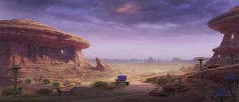 Movie still from “Planet 51” (2009), directed by Javier Abad – An image of a truck in the middle of the desert; Extreme Wide shot, High angle