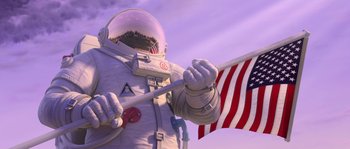 Movie still from “Planet 51” (2009), directed by Javier Abad – An image of an astronaut holding an american flag; Wide shot, Low angle