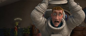 Movie still from “Planet 51” (2009), directed by Javier Abad – An image of an animated character in a space suit; Close Up shot, Over the shoulder angle