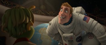 Movie still from “Planet 51” (2009), directed by Javier Abad – An animated man in a spacesuit looking at a cartoon character; Medium shot, Over the shoulder angle
