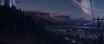 Movie still from “Planet 51” (2009), directed by Javier Abad – An aerial view of a city with mountains in the background; Extreme Wide shot, High angle