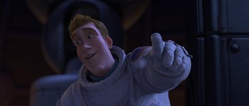 Movie still from “Planet 51” (2009), directed by Javier Abad – An animated figure of a man in a spacesuit pointing; Medium shot, Over the shoulder angle