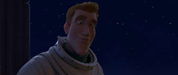 Movie still from “Planet 51” (2009), directed by Javier Abad – An animated character is smiling for the camera; Medium shot, Low angle