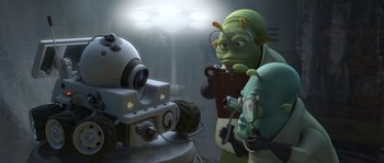 Movie still from “Planet 51” (2009), directed by Javier Abad – A group of people standing next to each other in a room; Wide shot, High angle
