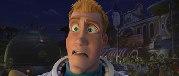 Movie still from “Planet 51” (2009), directed by Javier Abad – An animated man with green eyes looking surprised; Close Up shot, Low angle