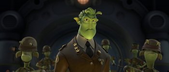Movie still from “Planet 51” (2009), directed by Javier Abad – An image of an animated character in a military uniform; Medium shot, Low angle
