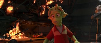 Movie still from “Planet 51” (2009), directed by Javier Abad – An animated character looks surprised at the camera; Medium shot, Over the shoulder angle