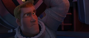 Movie still from “Planet 51” (2009), directed by Javier Abad – An image of an animated character in a space suit; Close Up shot, Low angle