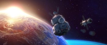 Movie still from “Planet 51” (2009), directed by Javier Abad – An image of a space ship flying over the earth; Extreme Wide shot, Low angle