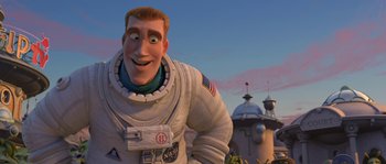 Movie still from “Planet 51” (2009), directed by Javier Abad – An image of an animated character in a space suit; Medium shot, Low angle