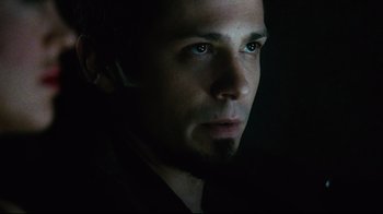 Movie still from “Planet Terror” (2007), directed by Robert Rodriguez – A person in a dark room; Close Up shot, Low angle
