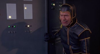 Movie still from “Planet of the Vampires” (1965), directed by Mario Bava – A wax figure of magneto from x - men; Medium shot, Low angle