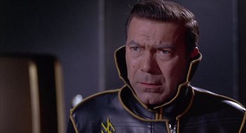 Movie still from “Planet of the Vampires” (1965), directed by Mario Bava – A person wearing a leather jacket; Close Up shot, Low angle