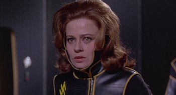 Movie still from “Planet of the Vampires” (1965), directed by Mario Bava – A person wearing a leather jacket; Close Up shot, Low angle