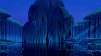 Movie still from “Pocahontas” (1995), directed by Mike Gabriel – A group of trees that are in the middle of a lake; Extreme Wide shot, Low angle