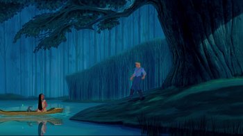 Movie still from “Pocahontas” (1995), directed by Mike Gabriel – A man standing next to a tree in the woods; Extreme Wide shot, High angle