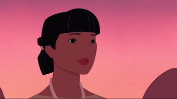Movie still from “Pocahontas” (1995), directed by Mike Gabriel – An animated picture of an asian woman with a pink sky in the background; Close Up shot, Over the shoulder angle