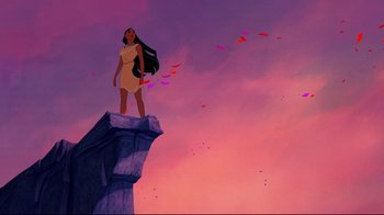 Movie still from “Pocahontas” (1995), directed by Mike Gabriel – A woman standing on top of a cliff; Extreme Wide shot, Low angle