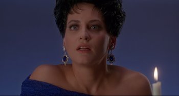 Movie still from “Poetic Justice” (1993), directed by John Singleton – A person wearing a blue dress; Close Up shot, Low angle