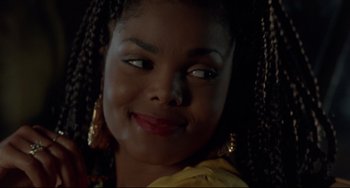 Movie still from “Poetic Justice” (1993), directed by John Singleton – A person wearing a yellow shirt; Close Up shot, Over the shoulder angle