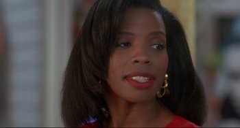 Movie still from “Poetic Justice” (1993), directed by John Singleton – A person with long hair; Close Up shot, Over the shoulder angle