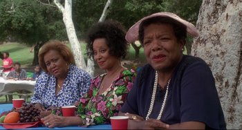 Movie still from “Poetic Justice” (1993), directed by John Singleton – A group of women sitting next to each other at a table; Medium shot, High angle