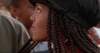 Movie still from “Poetic Justice” (1993), directed by John Singleton – A person with long braids; Close Up shot, Low angle