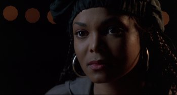 Movie still from “Poetic Justice” (1993), directed by John Singleton – A person wearing a hat; Close Up shot, Over the shoulder angle