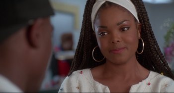 Movie still from “Poetic Justice” (1993), directed by John Singleton – A person wearing a headband; Close Up shot, Over the shoulder angle