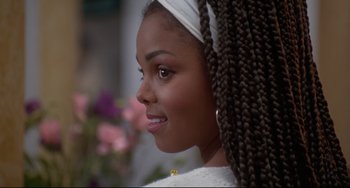 Movie still from “Poetic Justice” (1993), directed by John Singleton – A person wearing a white shirt; Close Up shot, Over the shoulder angle