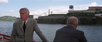 Movie still from “Point Blank” (1967), directed by John Boorman – Two men on a boat on a body of water; Wide shot, Over the shoulder angle